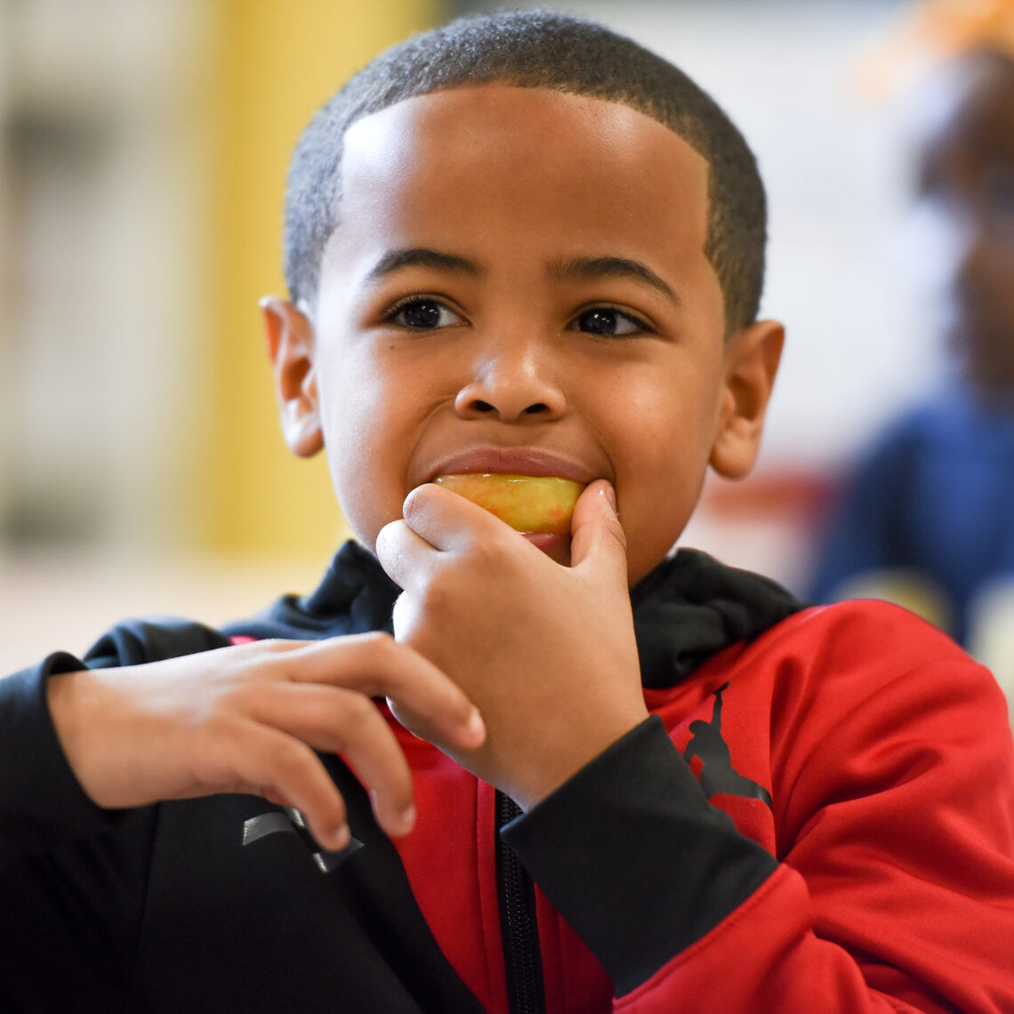 student eats breakfast in the classroom