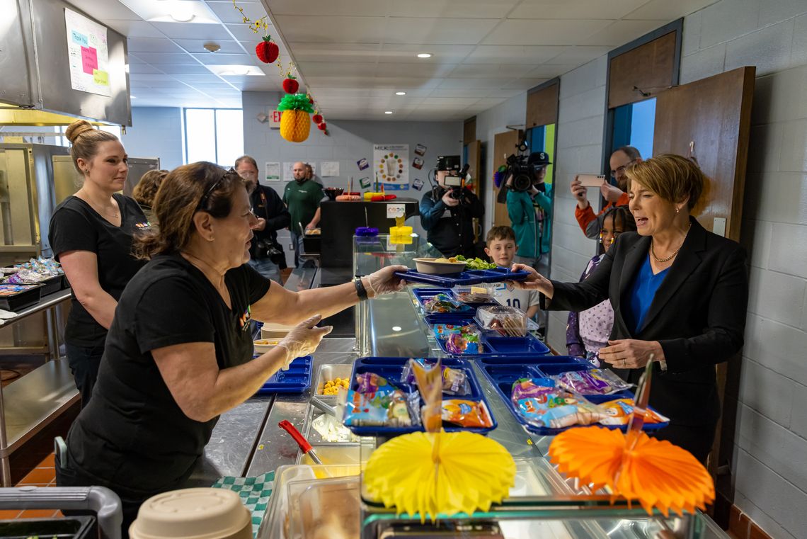 Gov Healey gets lunch tray in line at Hajjar Elementary
